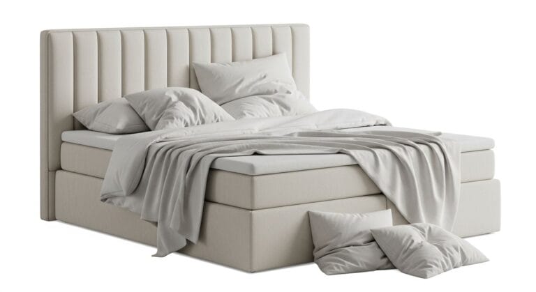 Ein modernes, elegantes, cremefarbenes Boxspringbett mit hohem, gepolstertem, gestepptem Kopfteil.
